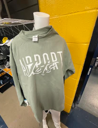 Green crewneck with white Airport Jets logo