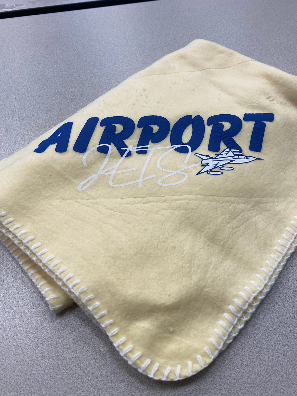 Yellow Baby blanket (Navy and white Airport Jets Logo)